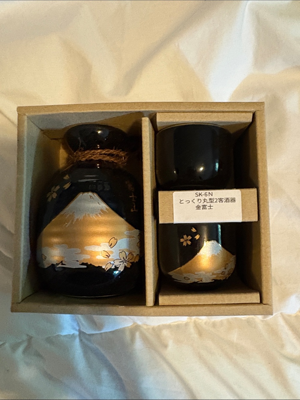 Black and Gold Ceramic Saki Set with Mount Fuji Motif